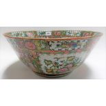 Cantonese famille rose punch bowl of typical decoration decorated with reserves of figures within