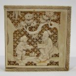 19th Century Cantonese carved ivory puzzle, the lid carved with two figures under a blossoming