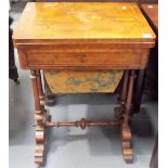 Victorian burr walnut veneered and boxwood strung games/work table, the hinge lid enclosing a swivel