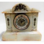 Alabaster two train mantel clock with French movement.