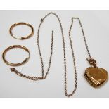 9ct gold heart shaped pendant locket on fine yellow metal chain; together with a pair of yellow
