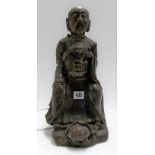 Chinese bronze modelled as Zhenwu, modelled seated wearing robe, a tortoise and snake at his feet,