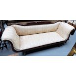 Early Victorian Mahogany settee with scroll arms and raised on turned legs, width 85in