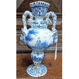 18th Century blue and white Delft pedestal twin handled vase, the handles modelled as writhing