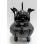 Chinese bronze incense burner of archaic design, the lid modelled as a Buddhist lion with gaping