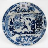 A Lowestoft 18th Century blue and white decorated plate with chinoiserie trellis decoration, Edgar A