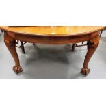 Good early 20th Century mahogany large oval dining table raised on four bold cabriole ball and