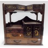 Japanese hard wood table cabinet with an arrangement of five drawers, pair of gilt painted lacquer