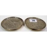 Pair of Persian white metal circular pin dishes, foliate embossed, diameter 3.25in, weight overall