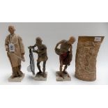 Three Indian terracotta figures with cold painted detail and wearing linen clothing, height of