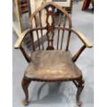 19th Century Elm Windsor elbow chair with lancet back and shaped pierced splat over a leather