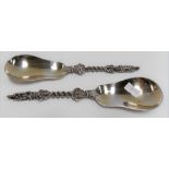Pair of Victorian silver apostle serving spoons with cast stems and pear shaped bowls, maker EH,