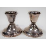 Pair of modern silver weighted squat candlesticks with weighted bases, Birmingham 1972.