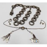 Silver filigree circular link necklace, weight 61.3g approx; together with a base metal moonstone