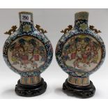 20th Century Chinese famille rose pair of moon flasks both sides decorated with reserves of