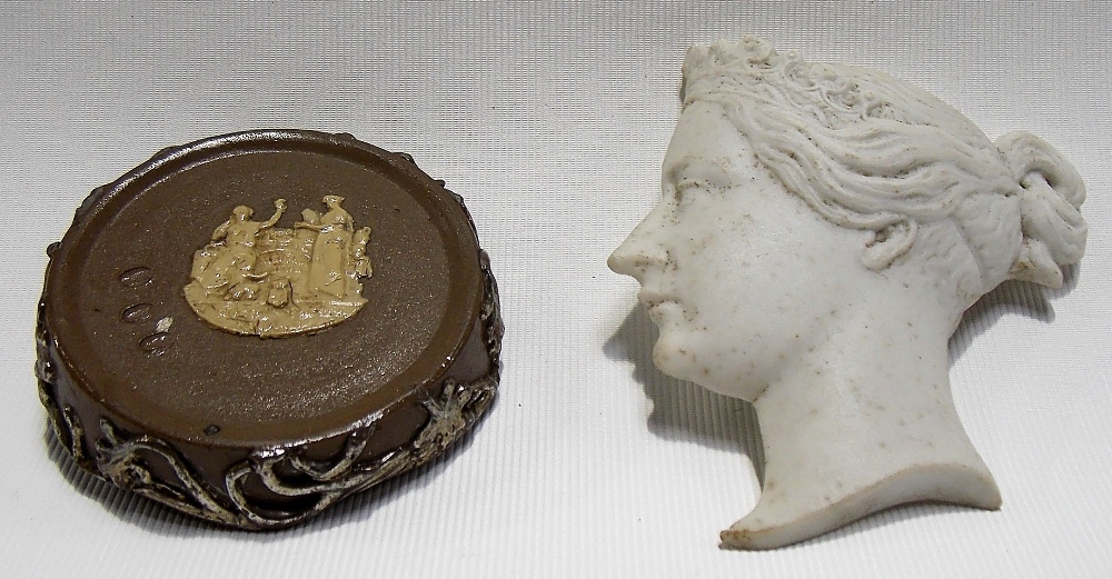 A parian silhouette of the young Queen Victoria, height 3in; together with a small circular sprigged