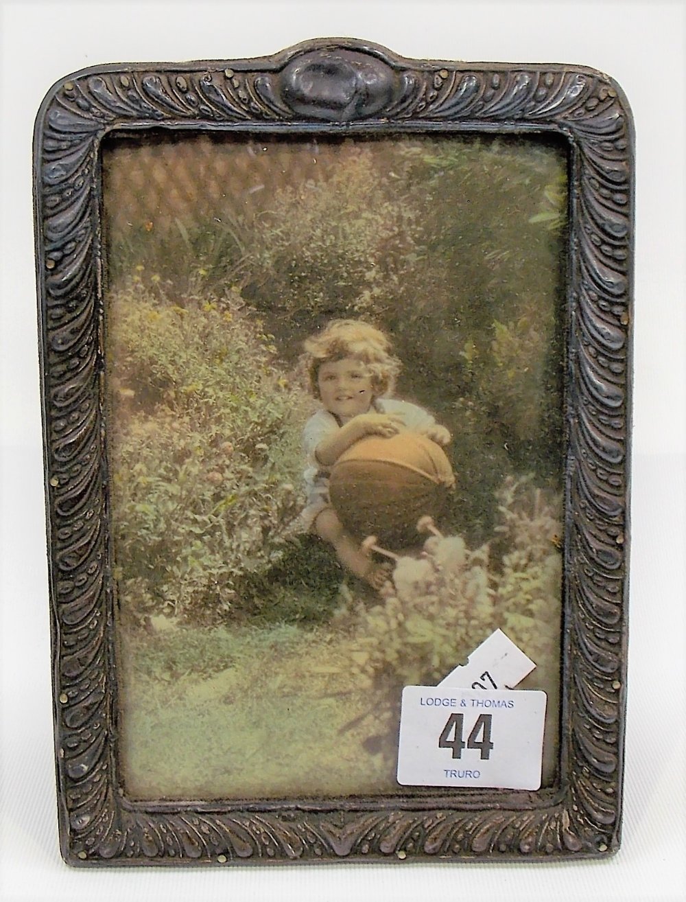 Edwardian silver mounted photograph frame of gadrooned embossed decoration, Birmingham 1903,