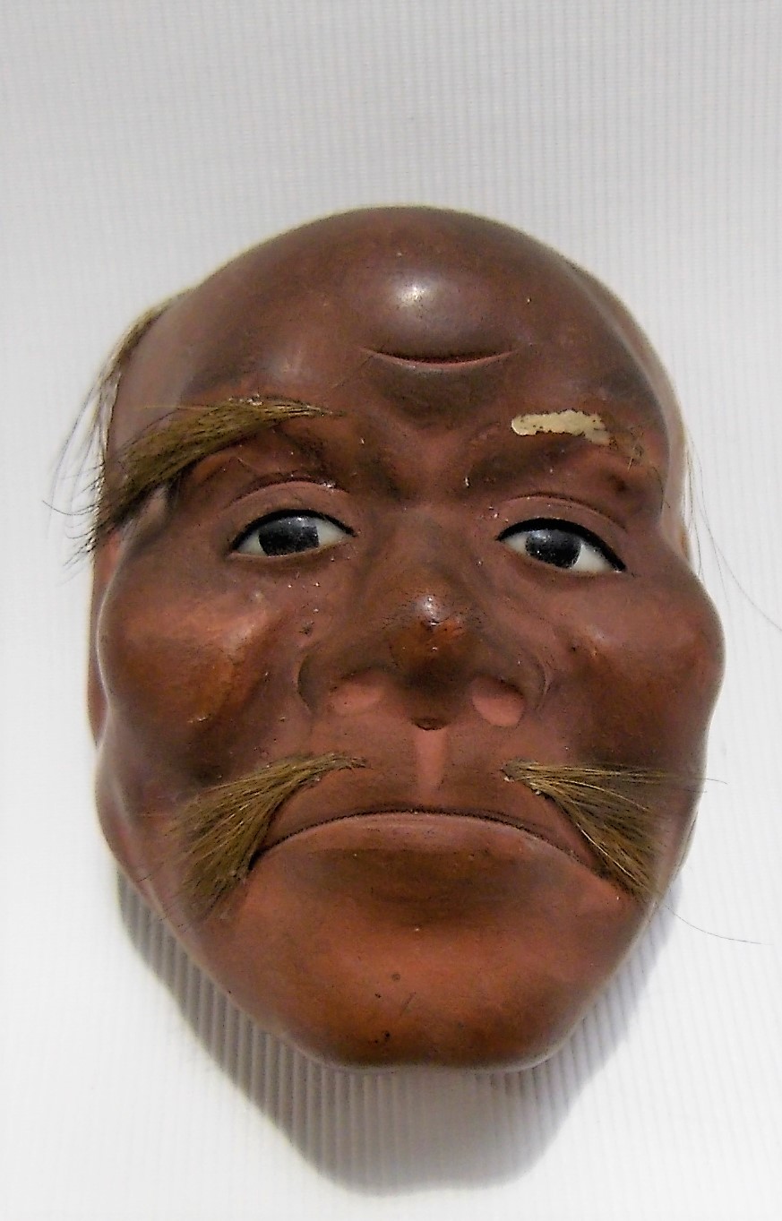 Japanese terracotta miniature mask with real hair to the eyebrows and moustache, length 2.25in