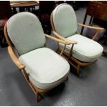 Pair of Ercol low armchairs.