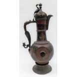 An Indo-Persian copper and enamel coffee pot of baluster pedestal form, the pierced dome lid with