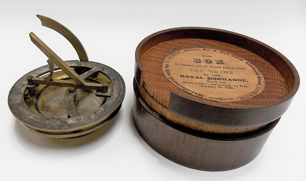 A brass lacquered folding sundial compass, with silvered dial and compass, unsigned, diameter 2.5in;