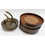 A brass lacquered folding sundial compass, with silvered dial and compass, unsigned, diameter 2.5in;