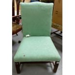 18th Century mahogany framed and upholstered nursing chair with shaped back.