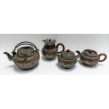 Chinese Yixing pewter encased four piece tea set, the sides decorated with dragons