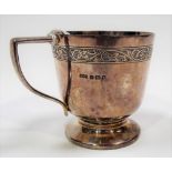 Silver Mappin & Webb pedestal christening cup with engraved foliate scroll band, inscribed '