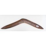 An Aboriginal boomerang, length 22.5in