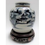 Chinese provincial ovoid blue and white ginger jar and cover decorated with a pagoda lake landscape,