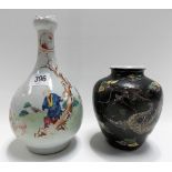 Chinese famille rose bottle vase decorated with figures in a landscape with sheep, height 9in (rim