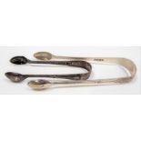 Victorian silver sugar tongs, London 1879; together with another pair of silver sugar tongs,