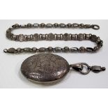 Victorian silver oval locket engraved with fern leaves, Birmingham 1881, attached to a fancy link