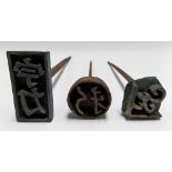 Three Chinese metal stamps/seals