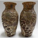 Pair of Japanese satsuma vases, decorated in relief with foliate enamels, height 14in