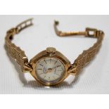 Rotary 9ct gold ladies manual wind bracelet wristwatch with 21 jewel movement upon 9ct gate link