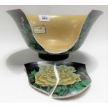 Chinese famille verte bowl, the sides decorated with phoenix amongst foliage upon a black ground,