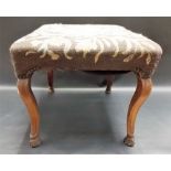 Early 18th Century Walnut woolwork upholstered square section footstool in need of restoration, with