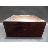 Walnut veneered dome lidded rectangular box with blue silk cushioned interior, width 12in.