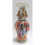 Chinese famille rose baluster vase, the flared neck applied with Fo dogs and Gui dragons, the body