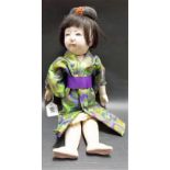 20th Century Japanese Papier Mache composition doll inscribed Tokyo SA, KA, MO, TO on the body,