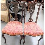 Pair of Edwardian salon chairs with pierced vase splats and stuff over seats on cabriole legs.