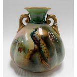 Royal Worcester small ovoid twin handled vase, painted with a Peacock upon branch within a