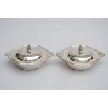 Lot: a pair of octagonal silver vegetable dishes with round plates (22x13cm)