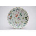 Chinese dish in porcelain with butterflies, marked (*) (24cm)