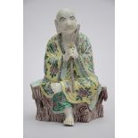 Figure in famille verte porcelain 'Lohan' (*) (21cm)