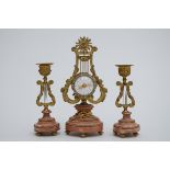Miniature Louis XVI clock set in pink marble and bronze
