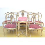 a Louis XV set : two chairs and armchairs, a table and a sofa