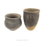 Two Roman earthenware beakers